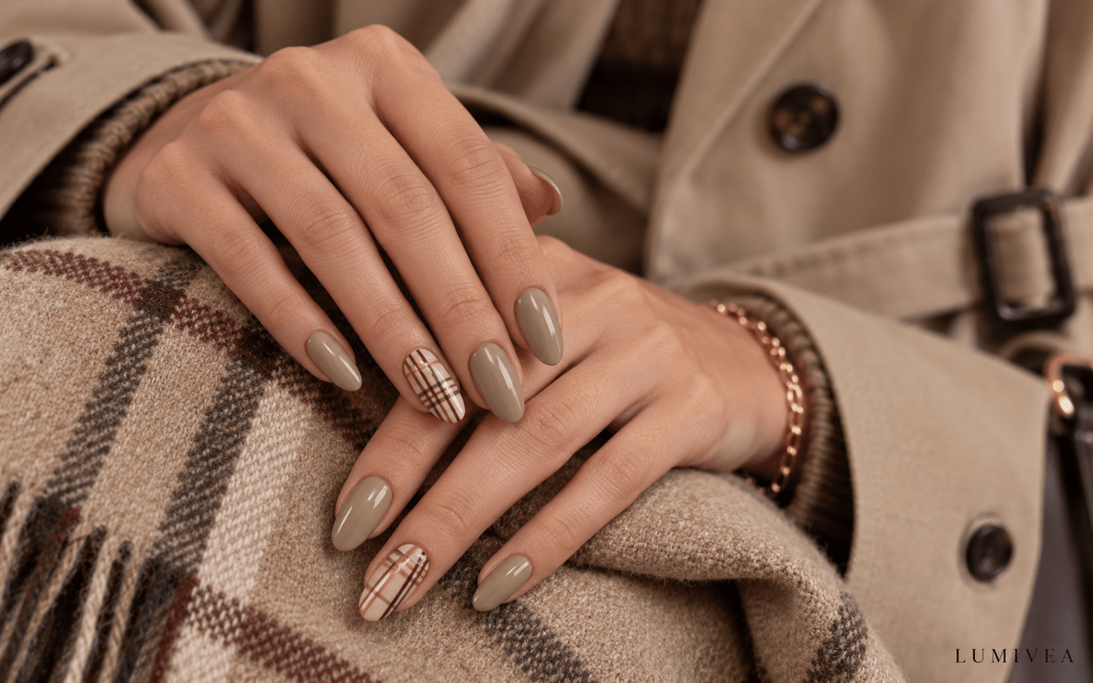 Classy fall plaid almond nails in nude, taupe, burgundy, camel and espresso with a Lumivea watermark